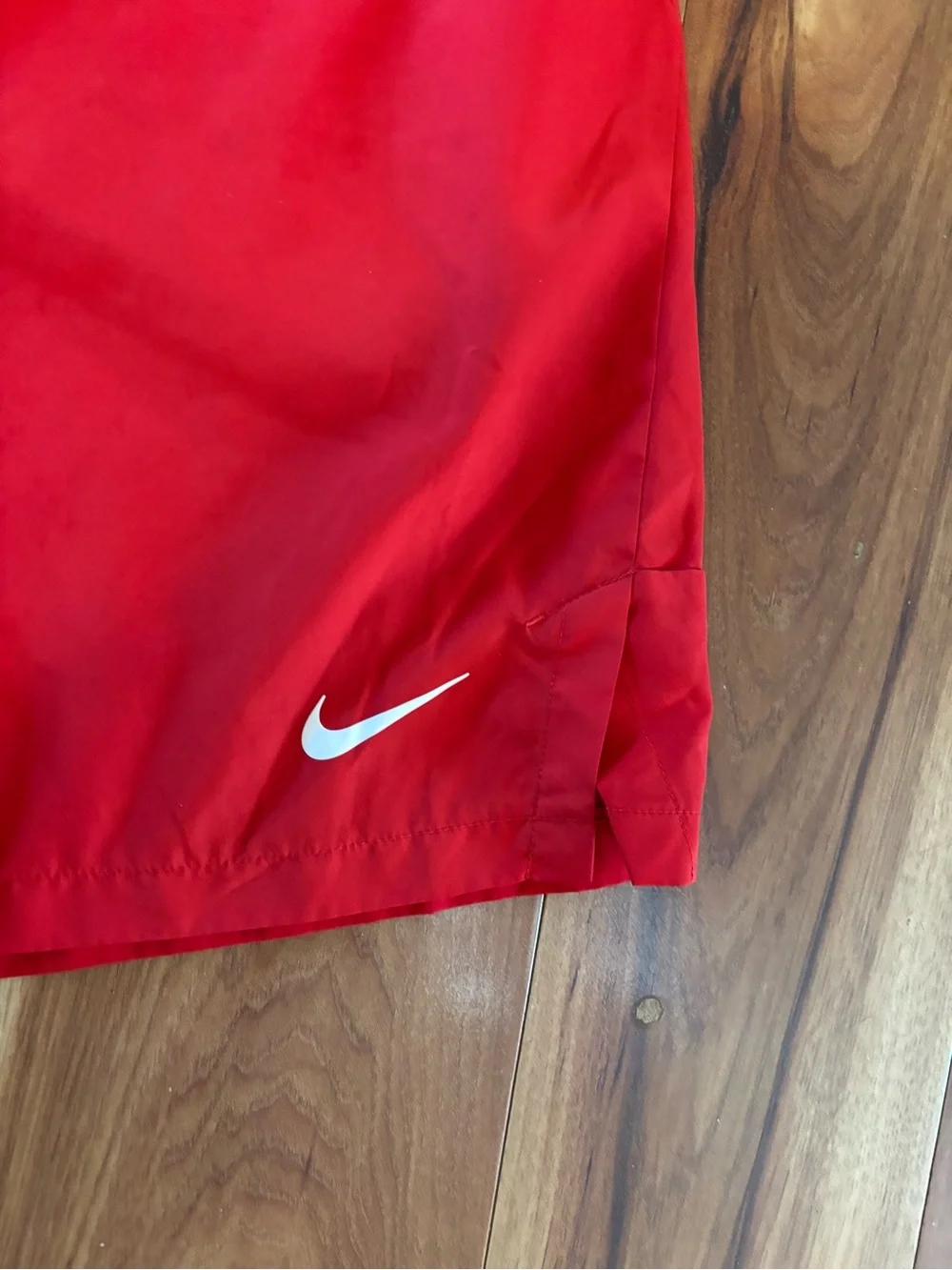 c-1 Nike Men’s Bright Red Athletic Shorts with White Swoosh.
